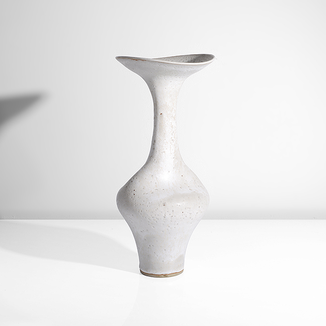 A white stoneware vase made by Lucie Rie in 1979 sold at auction by Maak Contemporary Ceramics