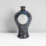 A blue stoneware bottle vase made by Japanese artist Matsuzaki Ken sold at auction by Maak