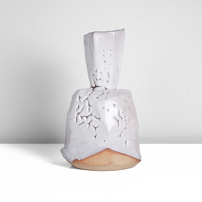 A white hagi stoneware vase made by Kaneta Masanao sold at auction by Maak